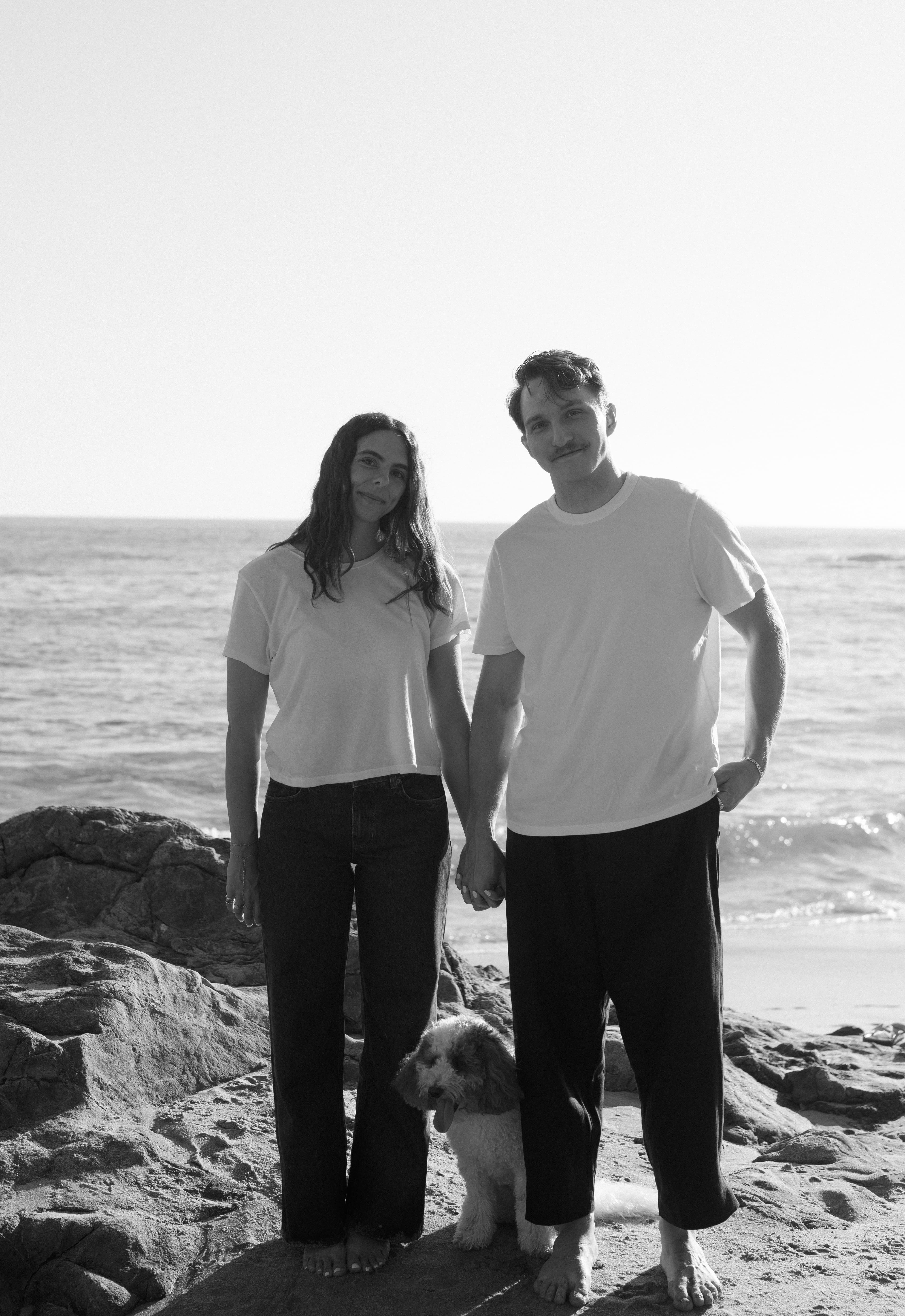 Chase, Chloe, and their dog on the beach